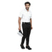 Male model wearing white half sleeve shirt and black pants, showcasing Merchant Navy uniform style with a professional look.