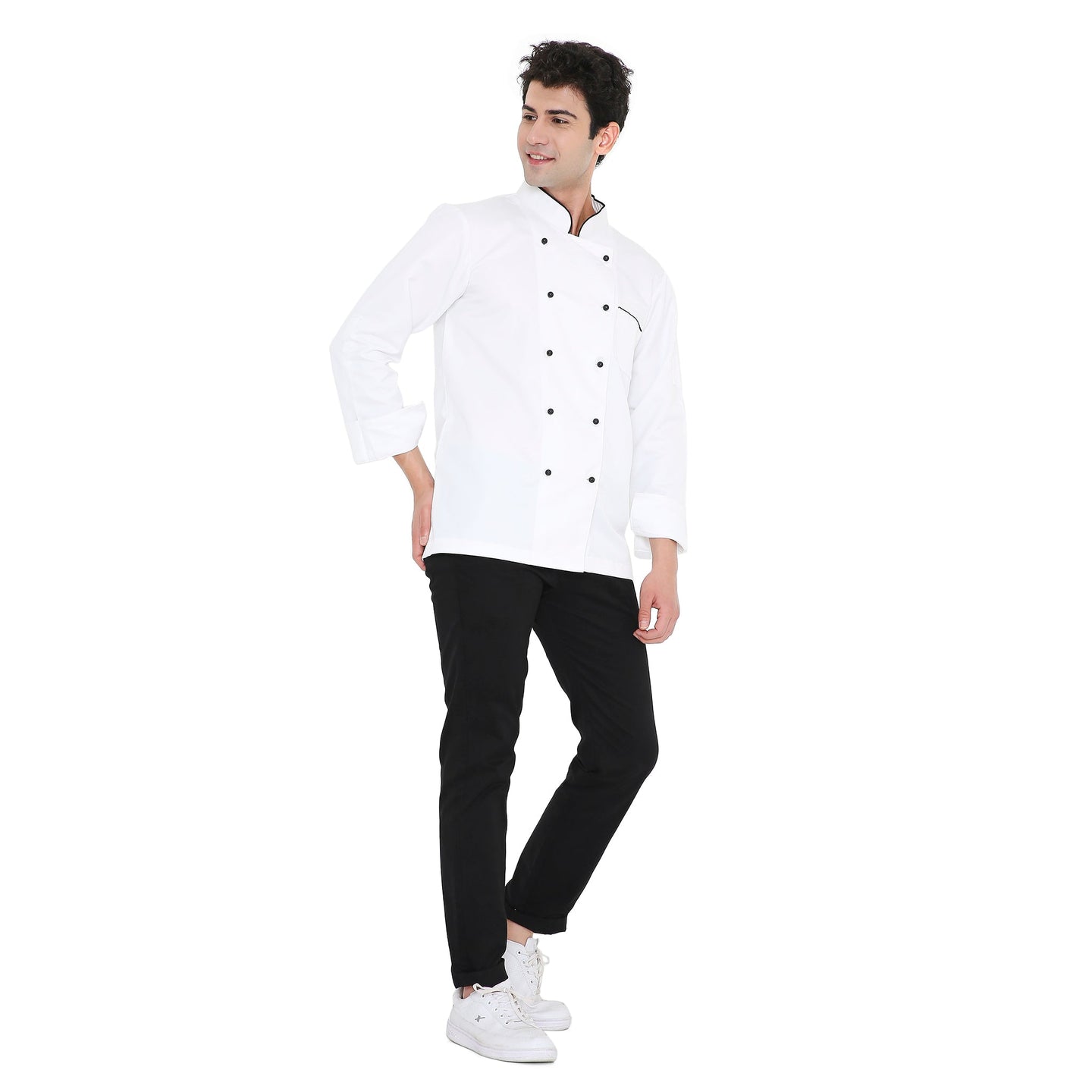 Model wearing a Classic Full Sleeve Chef Coat in white with black pants, showcasing durability and style for culinary professionals.