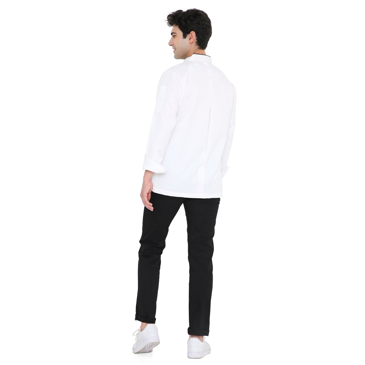 Model wearing a Classic Full Sleeve Chef Coat in white, showcasing the back design with black pants and white shoes.