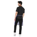 Back view of a man wearing a premium blue leatherette apron, showcasing stylish neck loops and broad coverage.