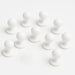 Set of ten white mushroom buttons for chef coats, customizable and durable for busy kitchens.