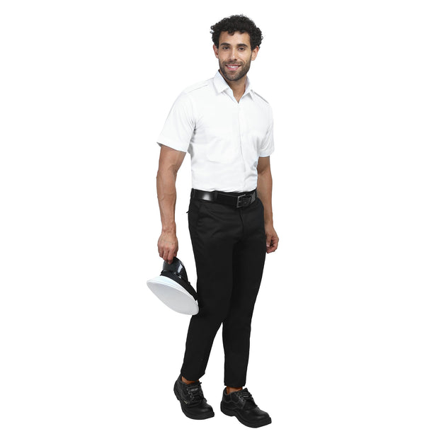 Male model wearing white half sleeve shirt and black pants, showcasing Merchant Navy uniform style with a professional look.
