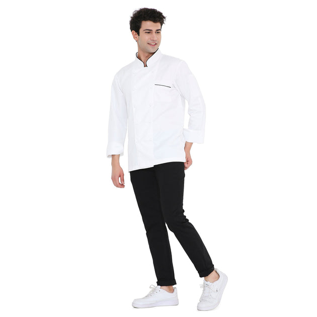 Model wearing a classic full sleeve white chef coat with black pants, showcasing stylish culinary workwear.