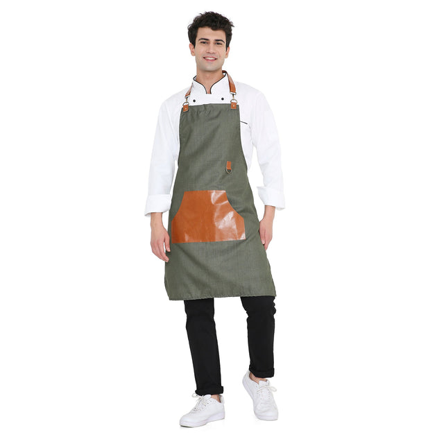 Premium green leather apron with big pocket and brass buckle, ideal for kitchen, bar, or cafe use.