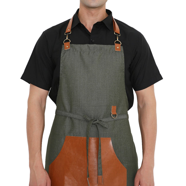 Premium green leather apron with big pocket, brass buckle and stylish back tie for versatile kitchen use.
