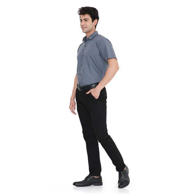 Men's half sleeve shirt in blue, ideal for service industry staff, featuring a slim fit and durable fabrics.