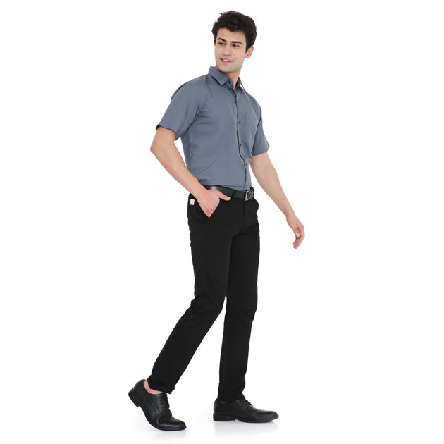 Men's half sleeve shirt in grey, worn with black pants, ideal for service staff and smart casual workwear.