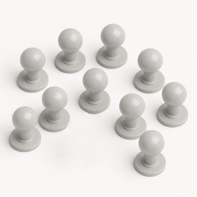 Set of ten removable mushroom buttons for chef coats in light gray color, customizable and durable for kitchen use.