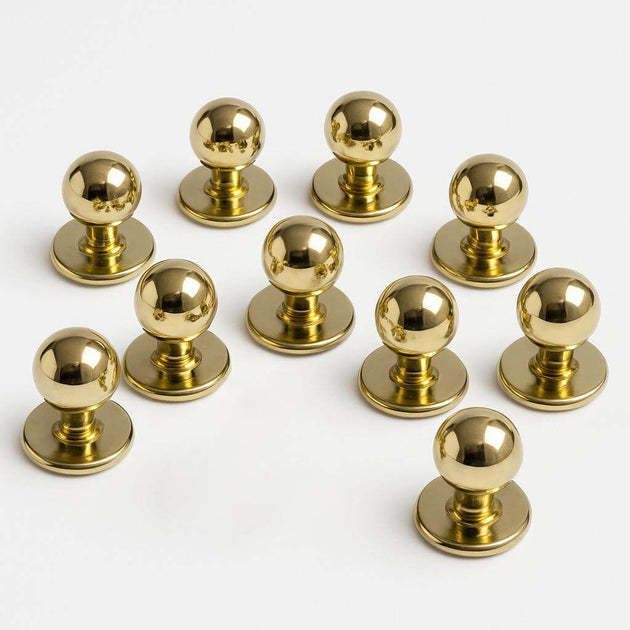 Set of ten shiny gold mushroom buttons for chef coats, customizable, durable and hygienic for busy kitchens.