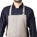 Sand beige apron front pocket detail — deep storage for kitchen tools