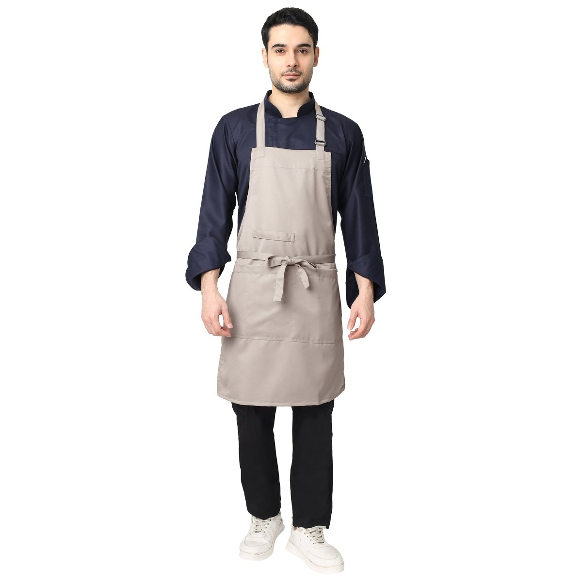 Sand beige kitchen apron on model — restaurant and cafe uniform India