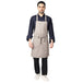Sand beige kitchen apron on model — restaurant and cafe uniform India