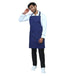 Blue apron front pocket detail — deep storage for kitchen tools