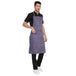 Grey kitchen apron on model — restaurant and cafe uniform India