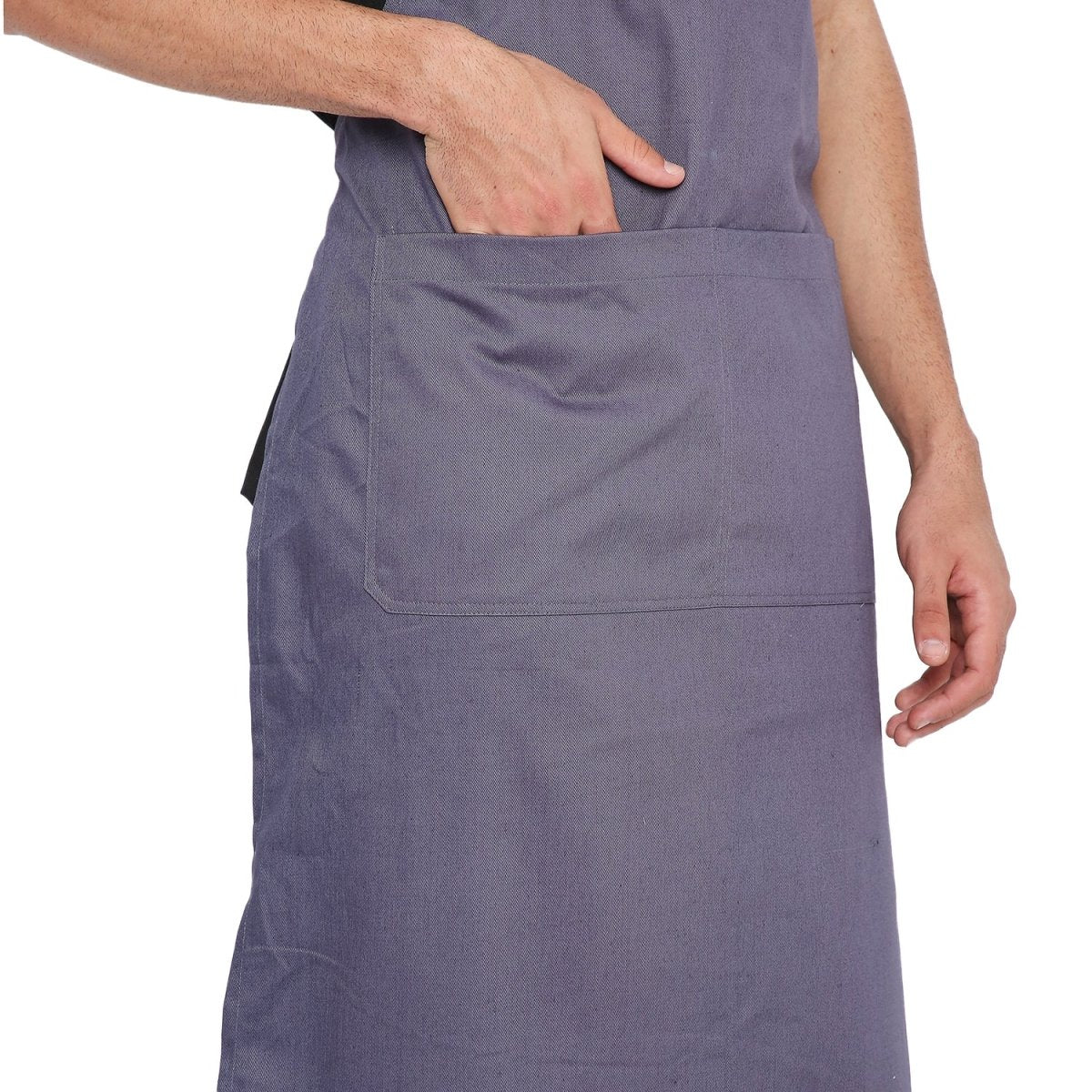 Grey bib apron flat lay — adjustable neck strap and waist tie