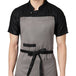 Grey black kitchen apron on model — restaurant and cafe uniform India