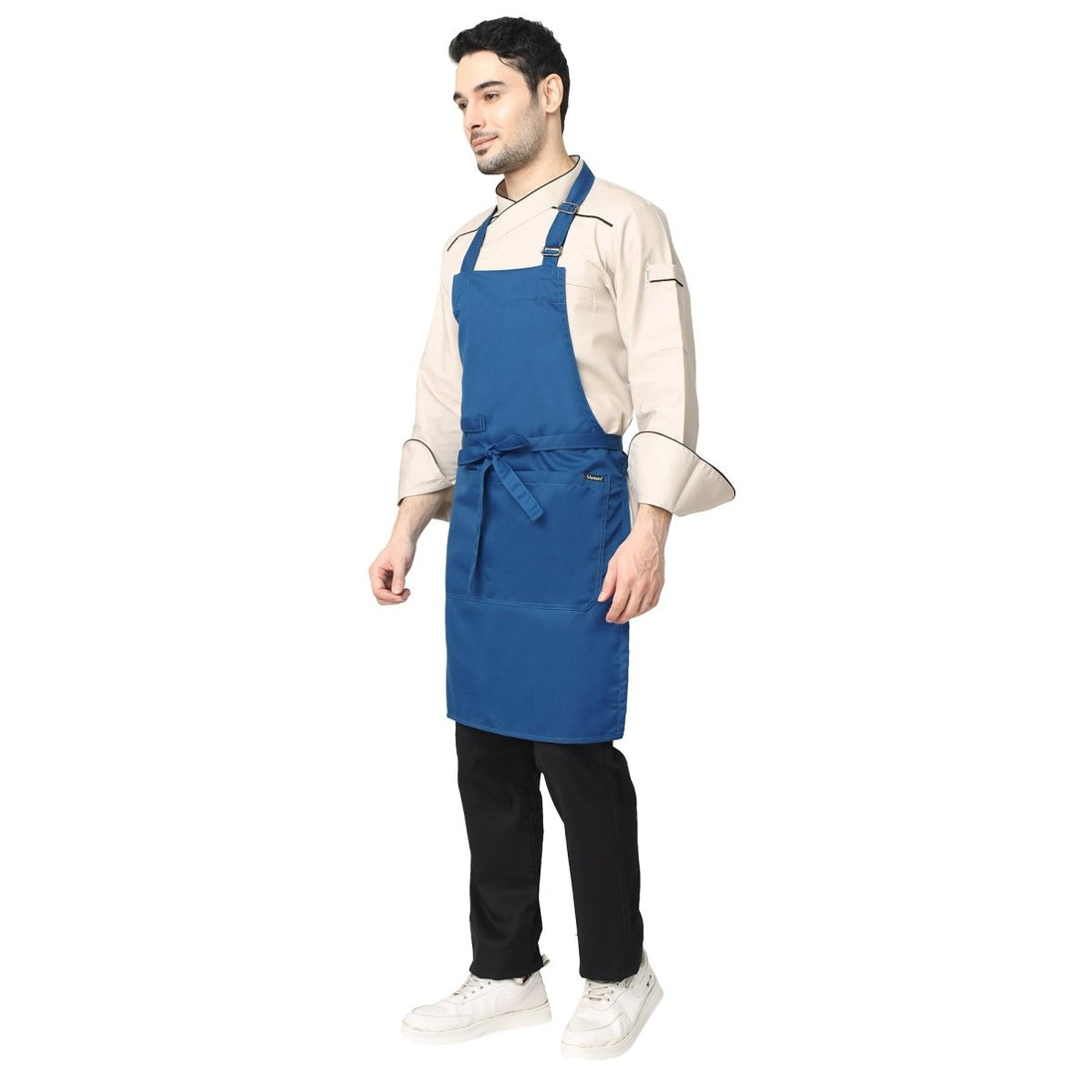 Royal blue apron front pocket detail — deep storage for kitchen tools
