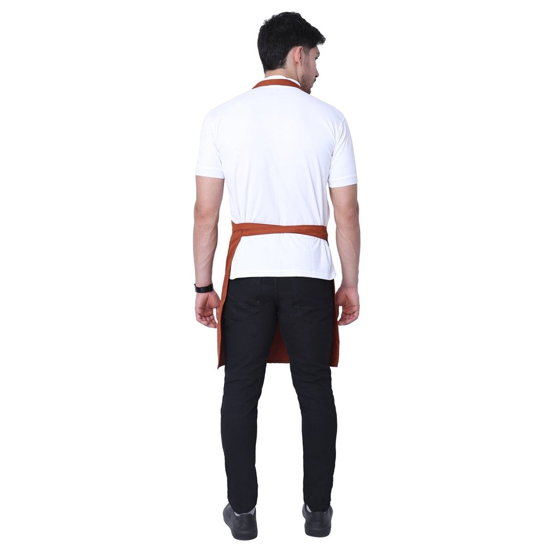 Rust orange kitchen apron on model — cafe and restaurant uniform India