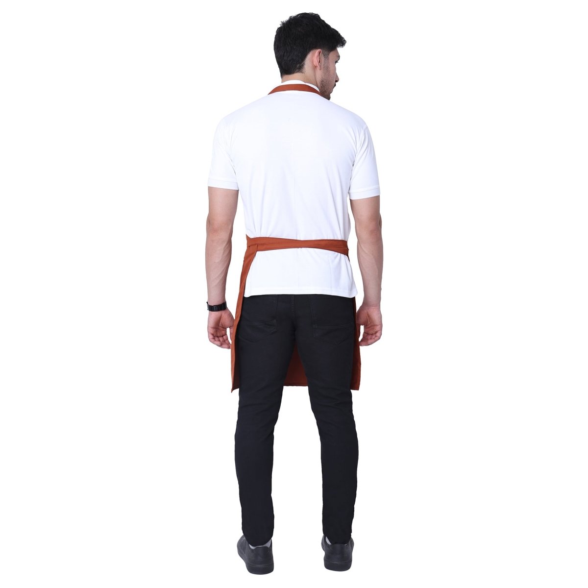 Rust orange kitchen apron on model — cafe and restaurant uniform India
