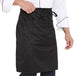 Black service apron on model — waiter and cafe staff uniform India