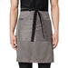 Grey black waist apron flat lay — restaurant uniform India