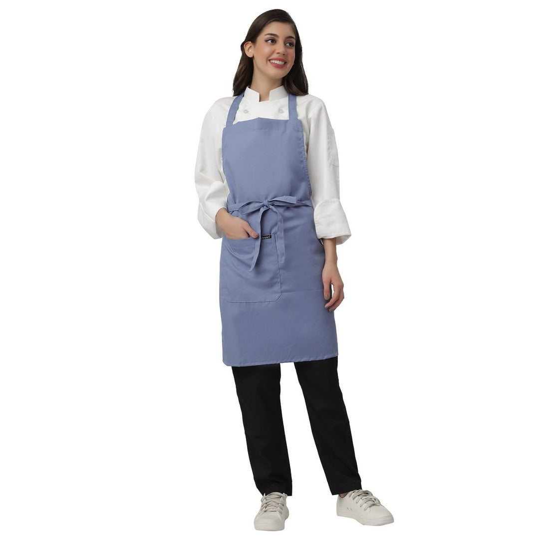 Pack of 4 ceil blue aprons on model — hotel and cafe staff uniform