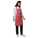Coral pink apron pocket detail — deep front pocket for kitchen staff