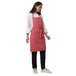 Coral pink apron pocket detail — deep front pocket for kitchen staff