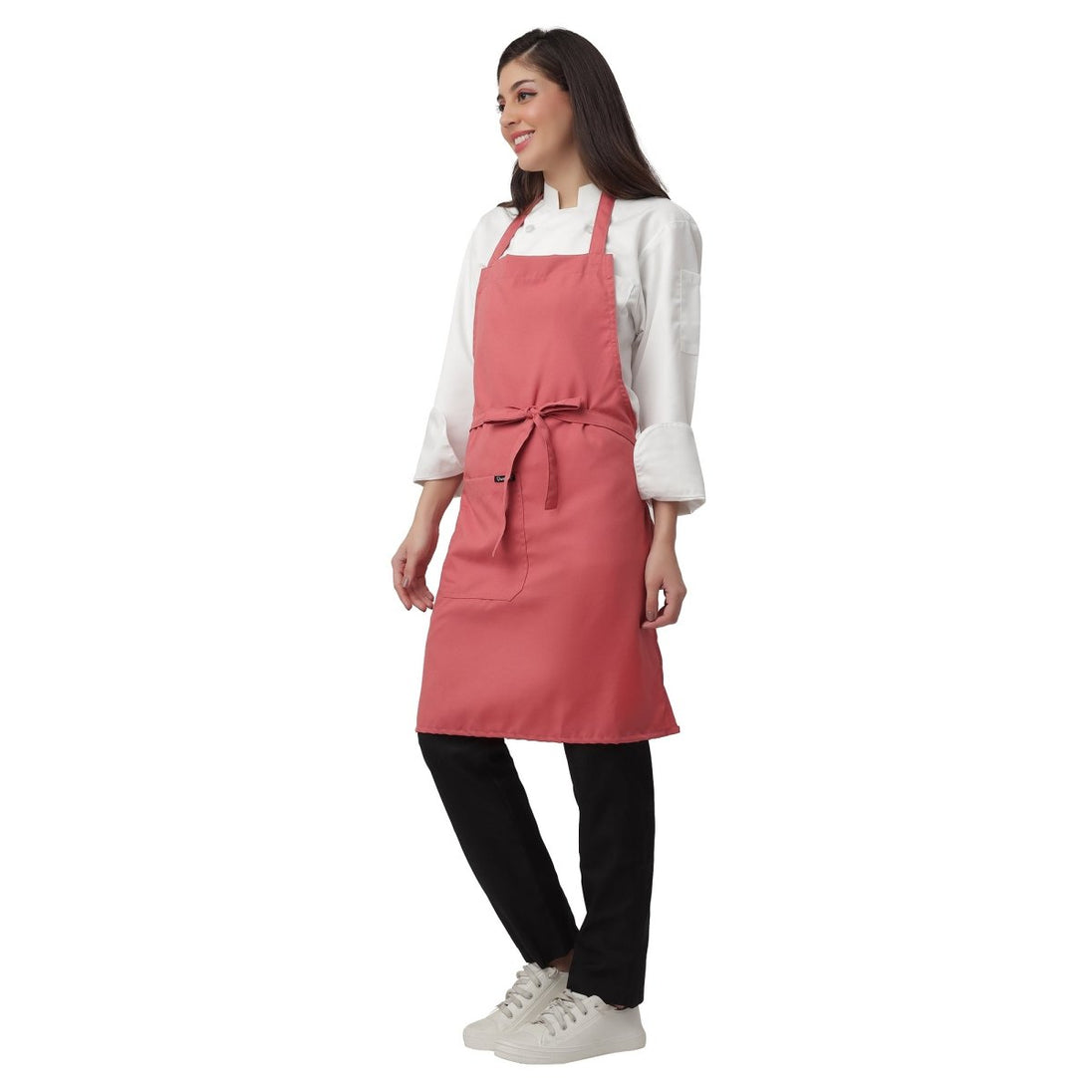 Set of 4 coral pink aprons laid out — bulk order free logo printing