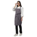 Set of 4 grey aprons laid out — bulk order free logo printing
