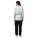 Set of 4 light green aprons laid out — bulk order free logo printing