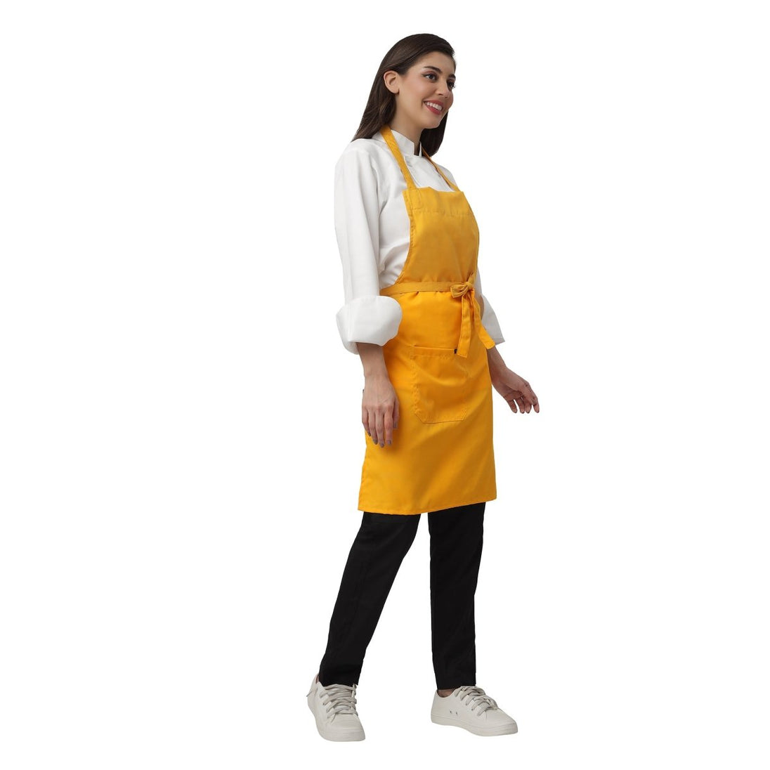 Mustard yellow apron pocket detail — deep front pocket for kitchen staff