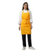 Set of 4 mustard yellow aprons laid out — bulk order free logo printing