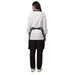 Custom logo on navy blue kitchen aprons — free embroidery bulk order