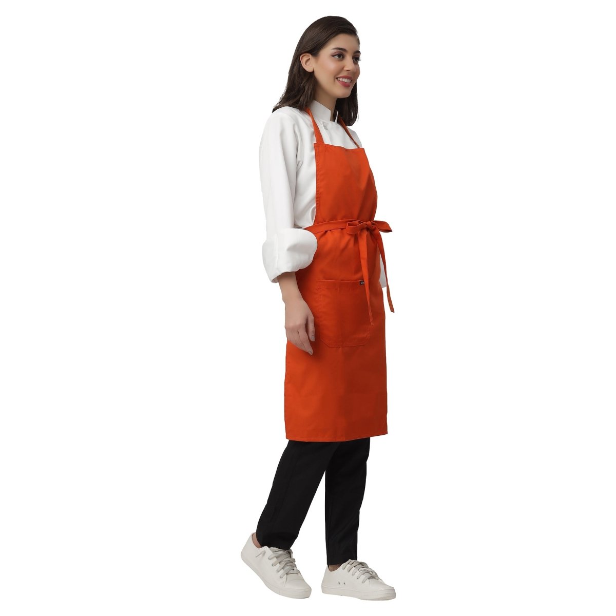 Orange apron pocket detail — deep front pocket for kitchen staff