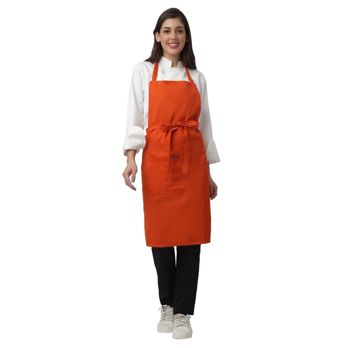 Set of 4 orange aprons laid out — bulk order free logo printing