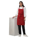 Red apron pocket detail — deep front pocket for kitchen staff
