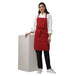 Red apron pocket detail — deep front pocket for kitchen staff