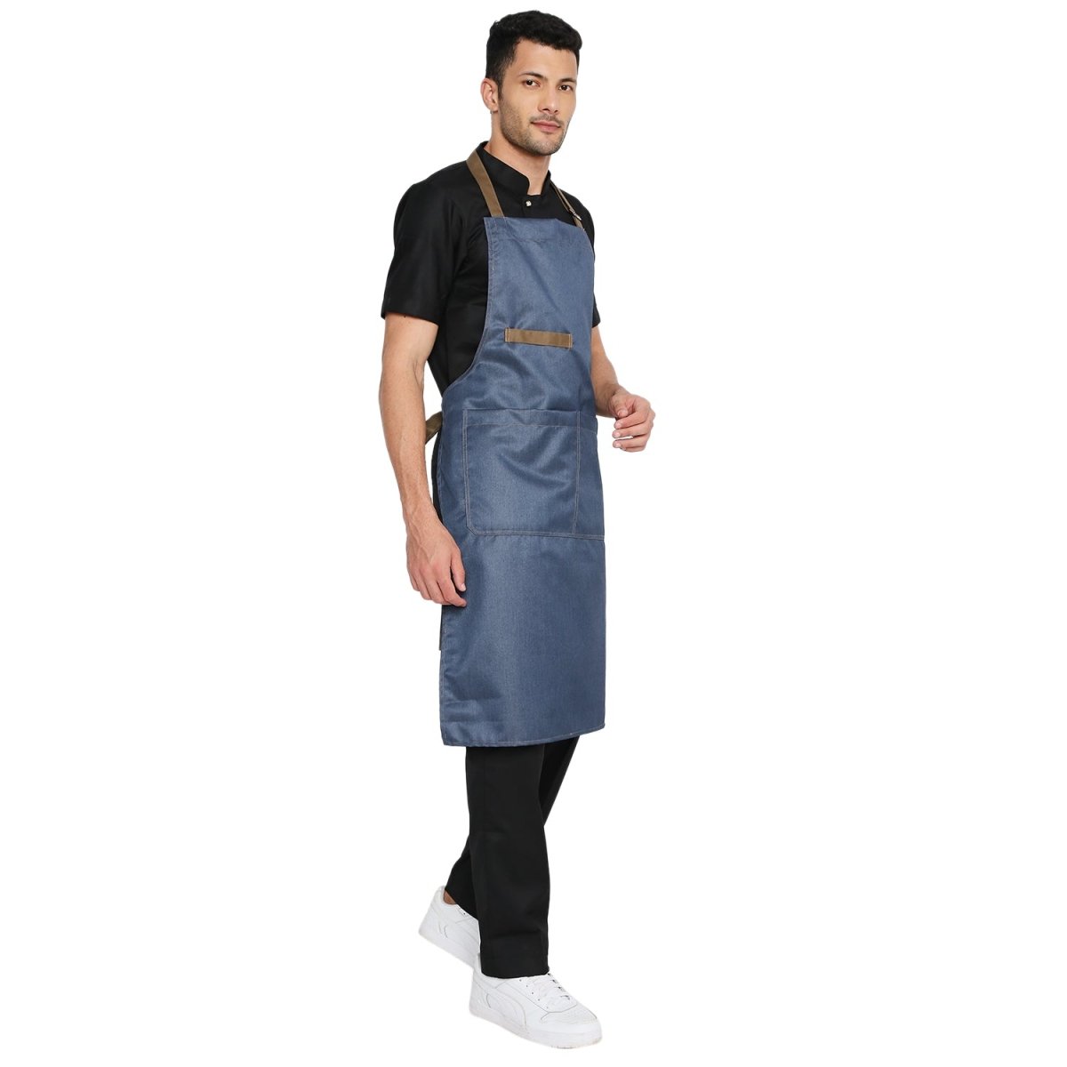Denim apron neck strap and buckle close-up — adjustable fit