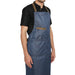 Denim apron front pocket detail — spacious storage for kitchen tools
