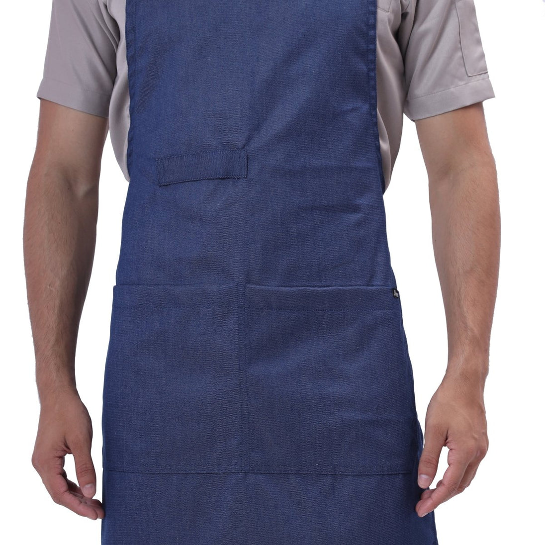 Custom logo embroidery on blue denim kitchen apron — free embroidery service