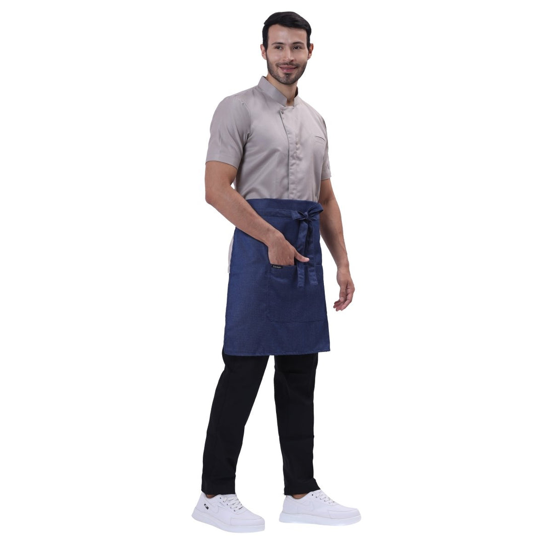 Classic blue denim waist apron pocket detail — front pocket for order pad