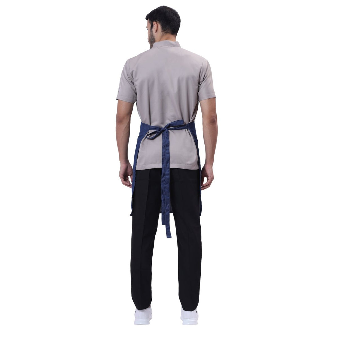 Classic blue denim service apron on model — cafe and restaurant uniform India